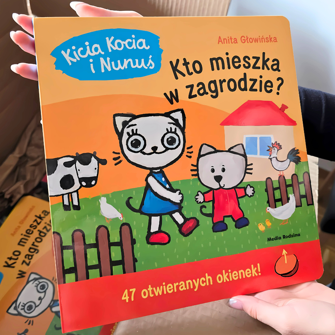 Okładka książki „Kicia Kocia i Nunuś. Kto mieszka w zagrodzie?”  - okładka widziana z przodu. Wydawnictwo Media Rodzina / Kraina Milusi