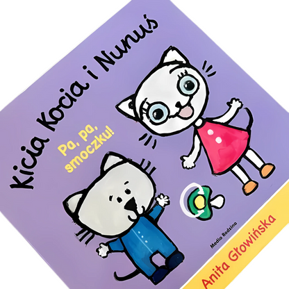 Okładka książki "Kicia Kocia i Nunuś. Pa, pa smoczku!" widziana z ukosa / Kraina Milusi 