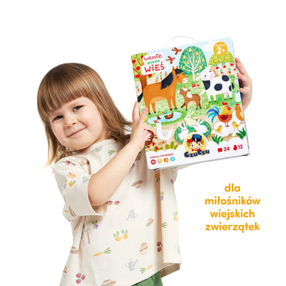 Wesołe Puzzle "Wieś" od CzuCzu dla Maluszków - dziecko podczas zabawy.